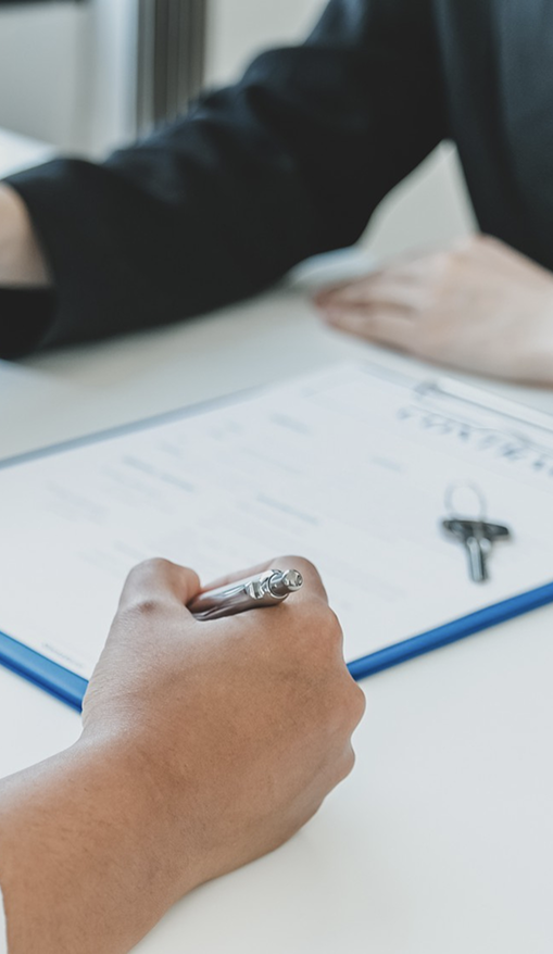 Group booking consultation with pen and clipboard